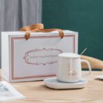 Coffee mug with saucer and spoon